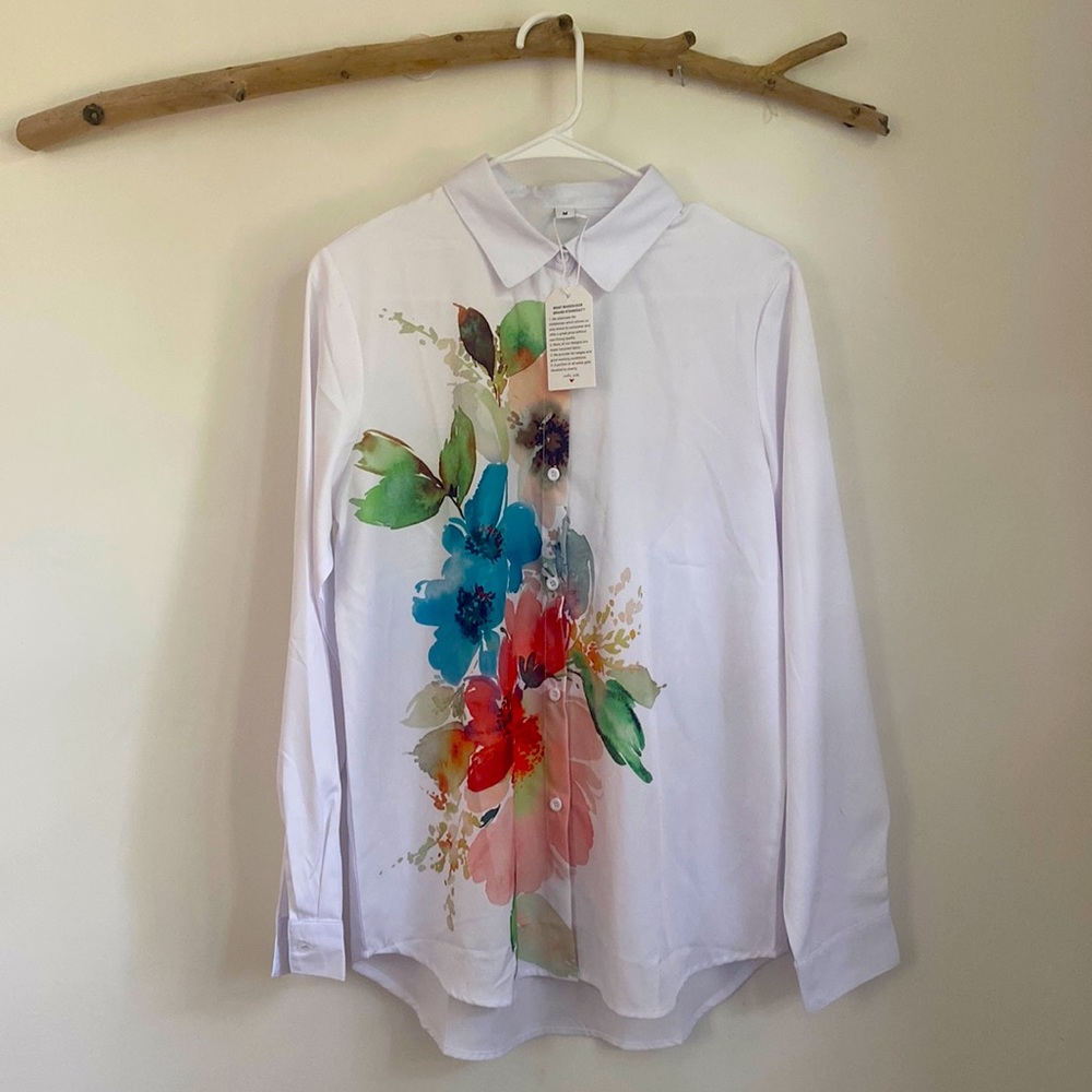 Blouse with bright floral image